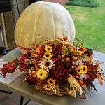 white pumpkin and fall floral decor