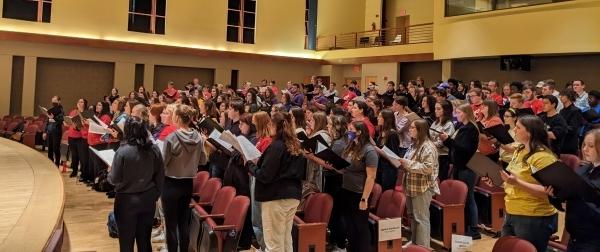 auditorium filled with singers