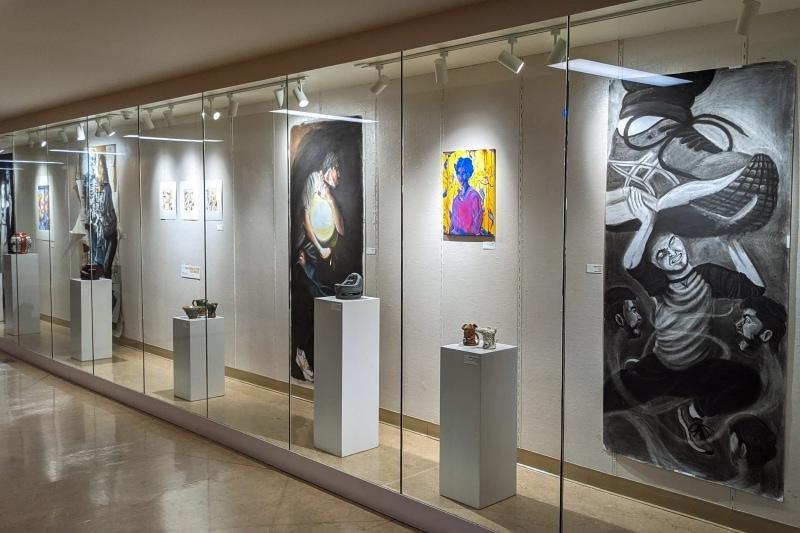 gallery with artwork behind glass